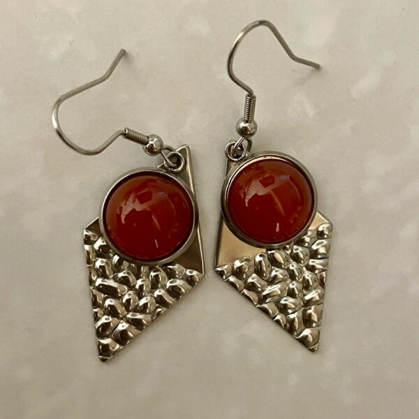 Pair of silver geometric earrings with red cabochons