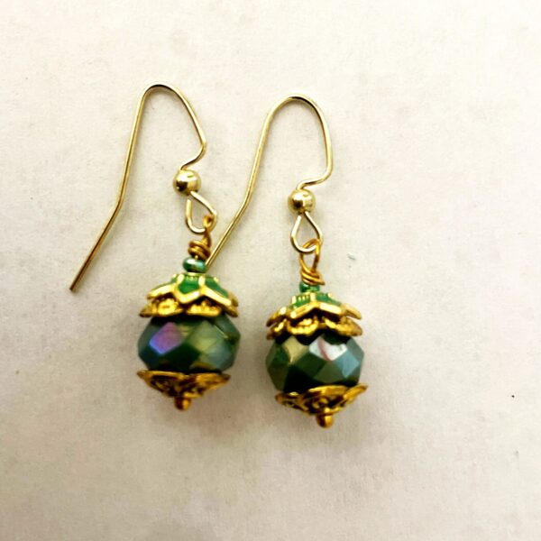 Gold hook earrings with green faceted beads