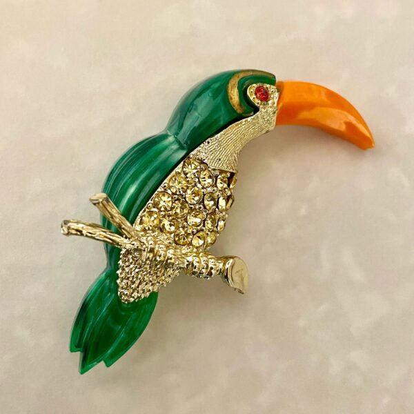 Stylish green toucan brooch with gems