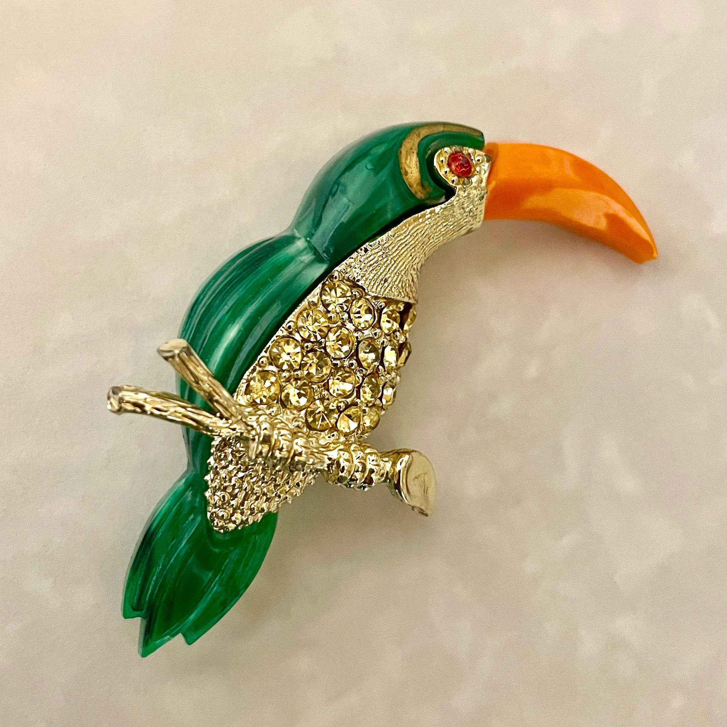 Stylish green toucan brooch with gems