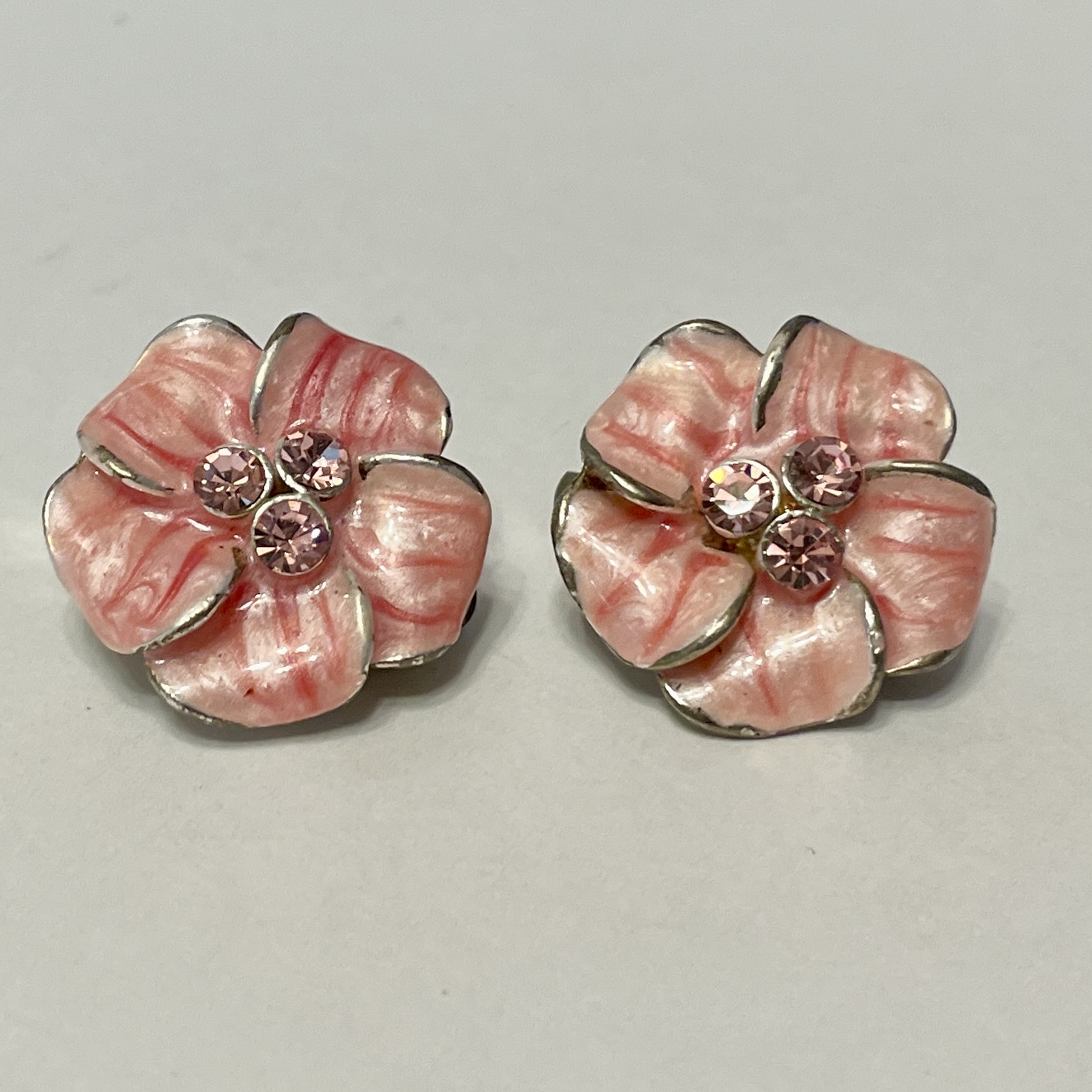 Pair of pink flower-shaped rhinestone earrings