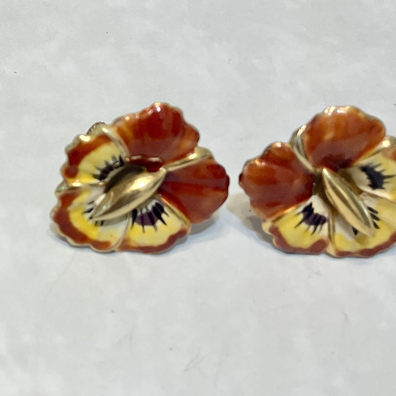 Pair of orange-yellow pansy earrings