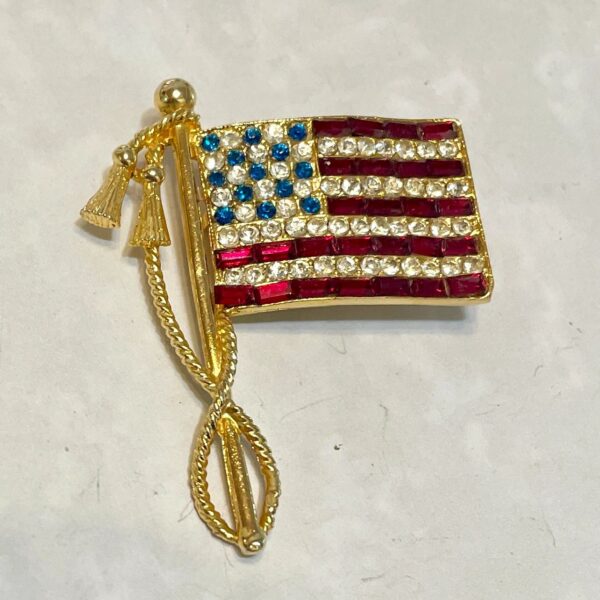 Gold rhinestone American flag brooch