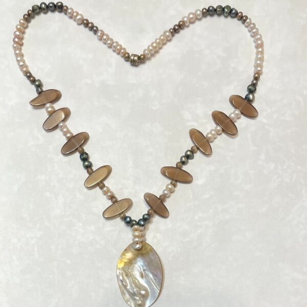 Pearl necklace with shell pendant heart-shaped