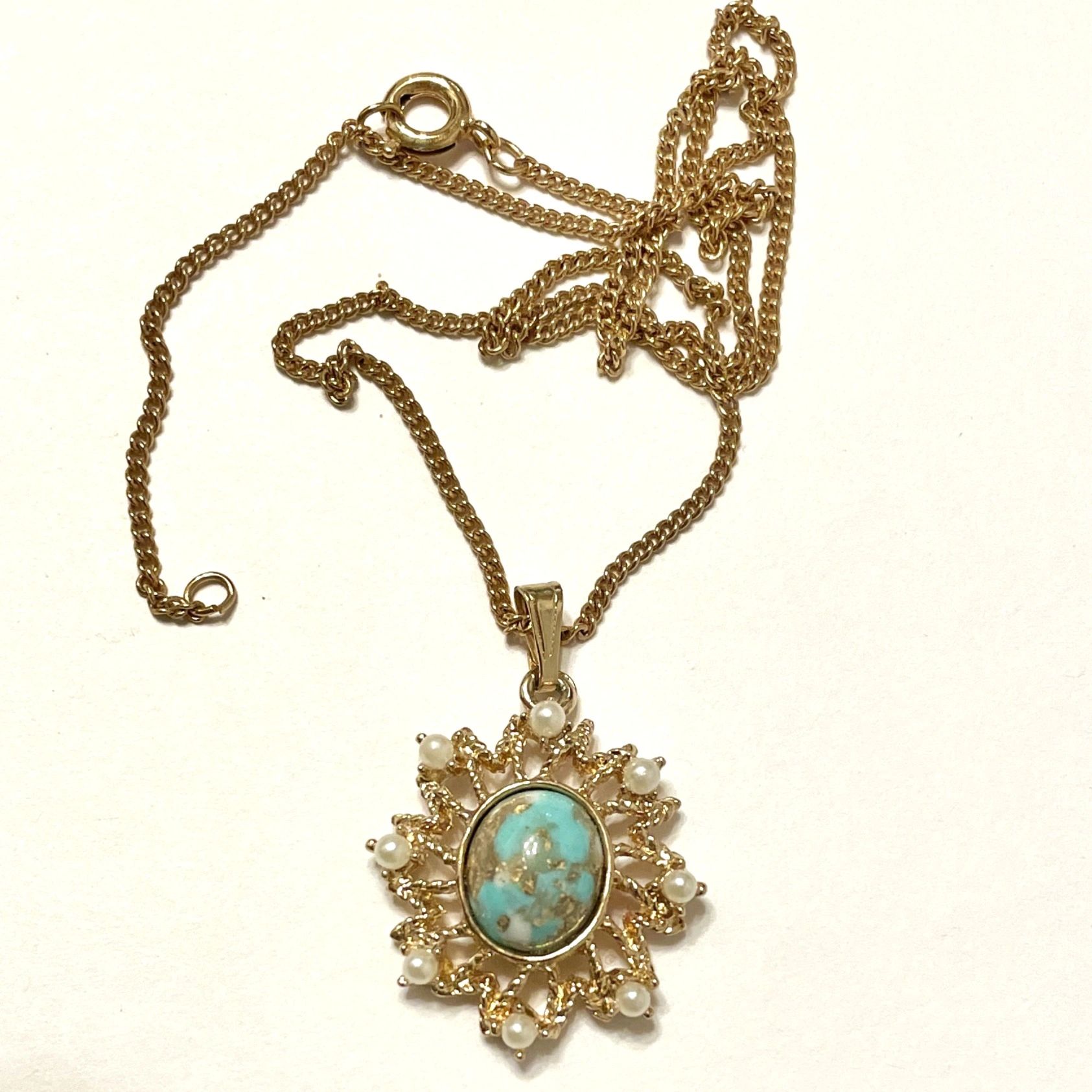 Gold chain necklace with turquoise and pearl pendant
