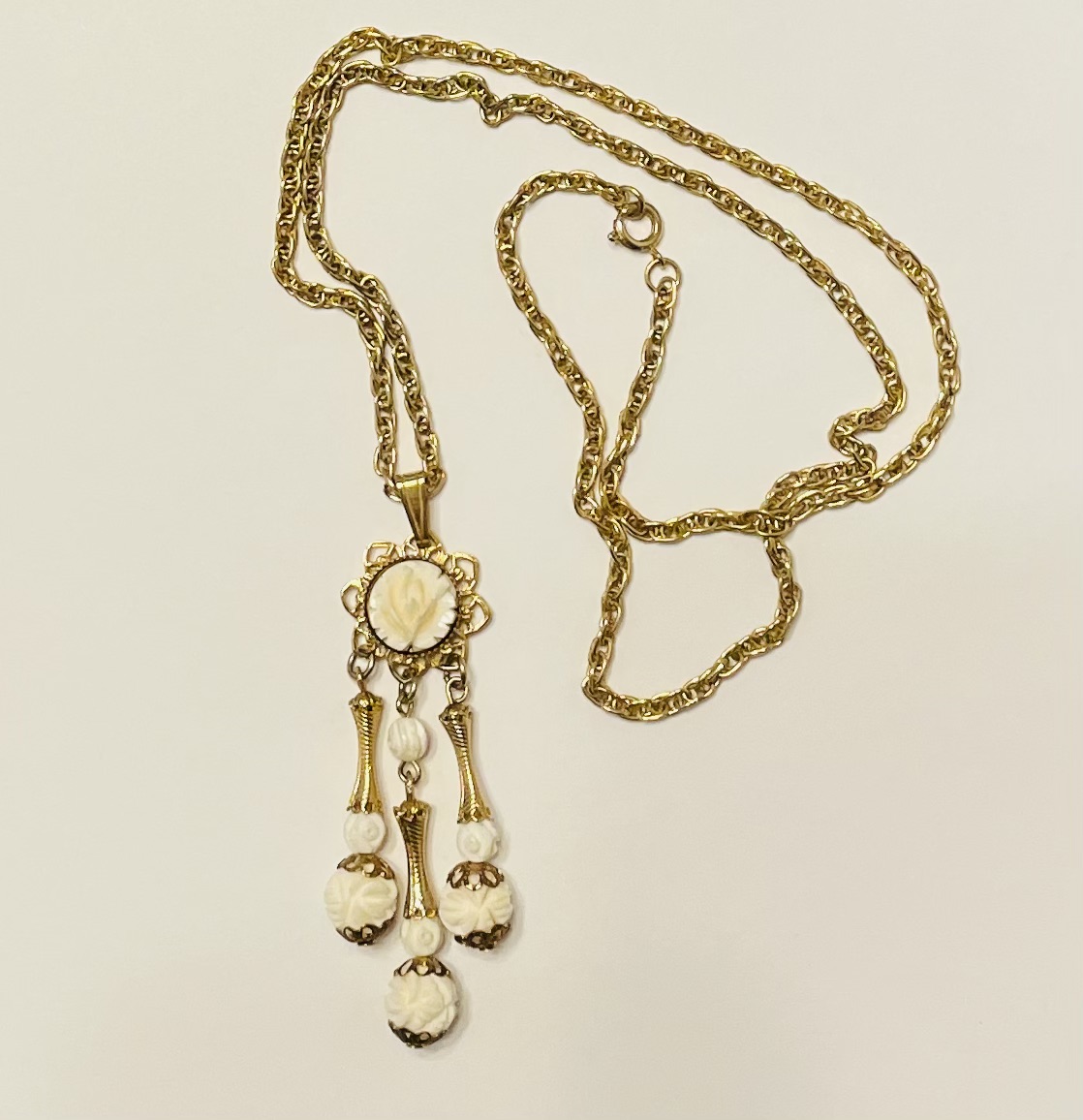 Vintage gold pendant necklace with tassels