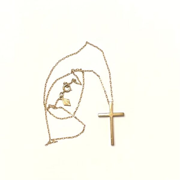 Gold cross pendant on delicate chain