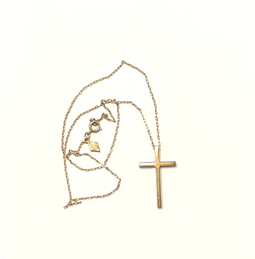 Gold cross pendant on delicate chain