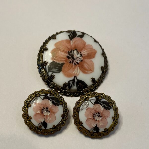 Three vintage floral porcelain cabochons in filigree frames