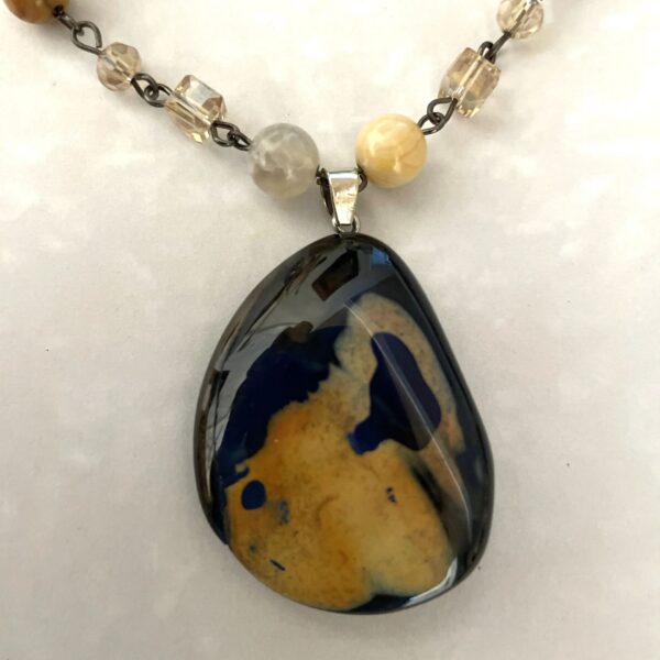 Blue and yellow teardrop stone pendant necklace