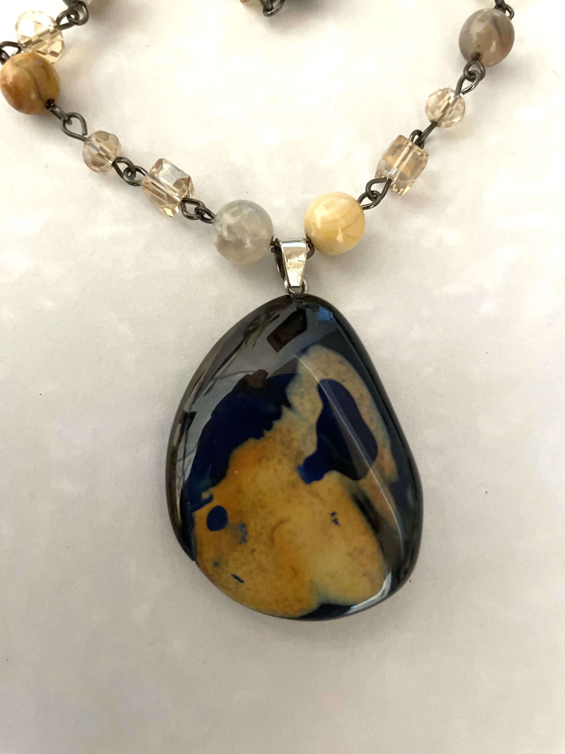 Blue and yellow teardrop stone pendant necklace