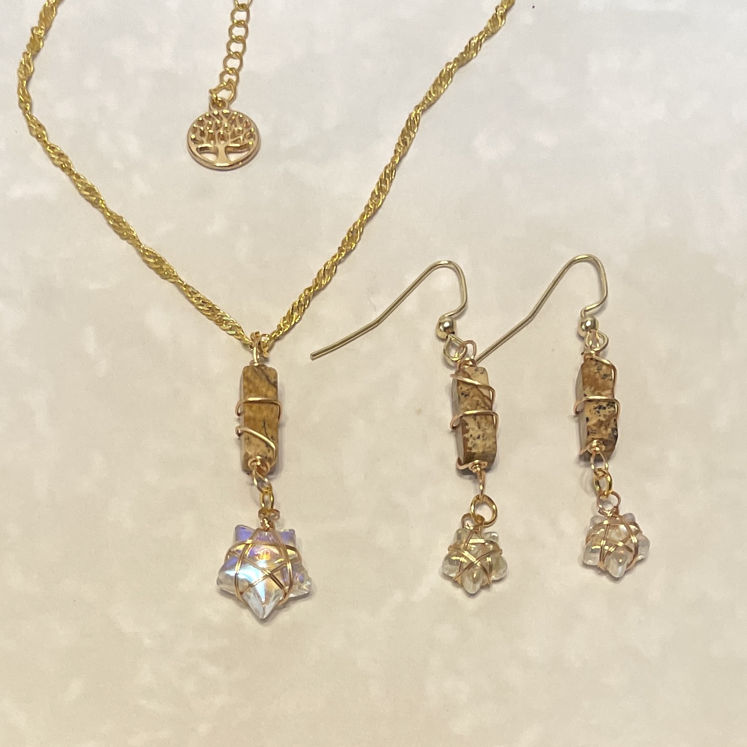 Gold jewelry set with crystal star drops