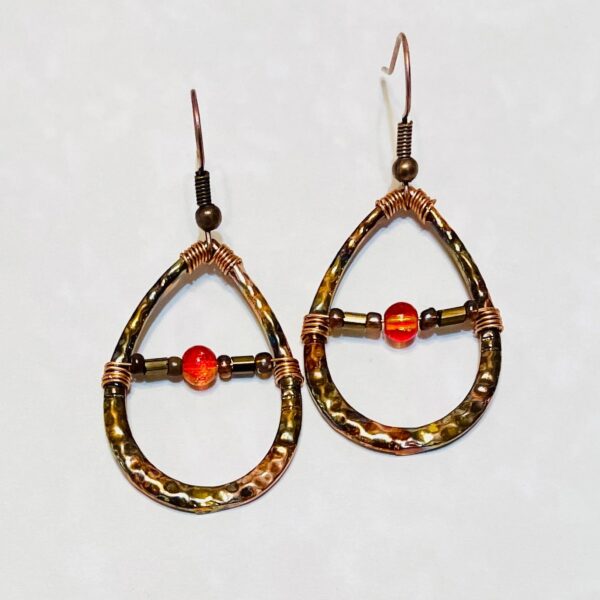Hammered copper teardrop earrings with orange beads