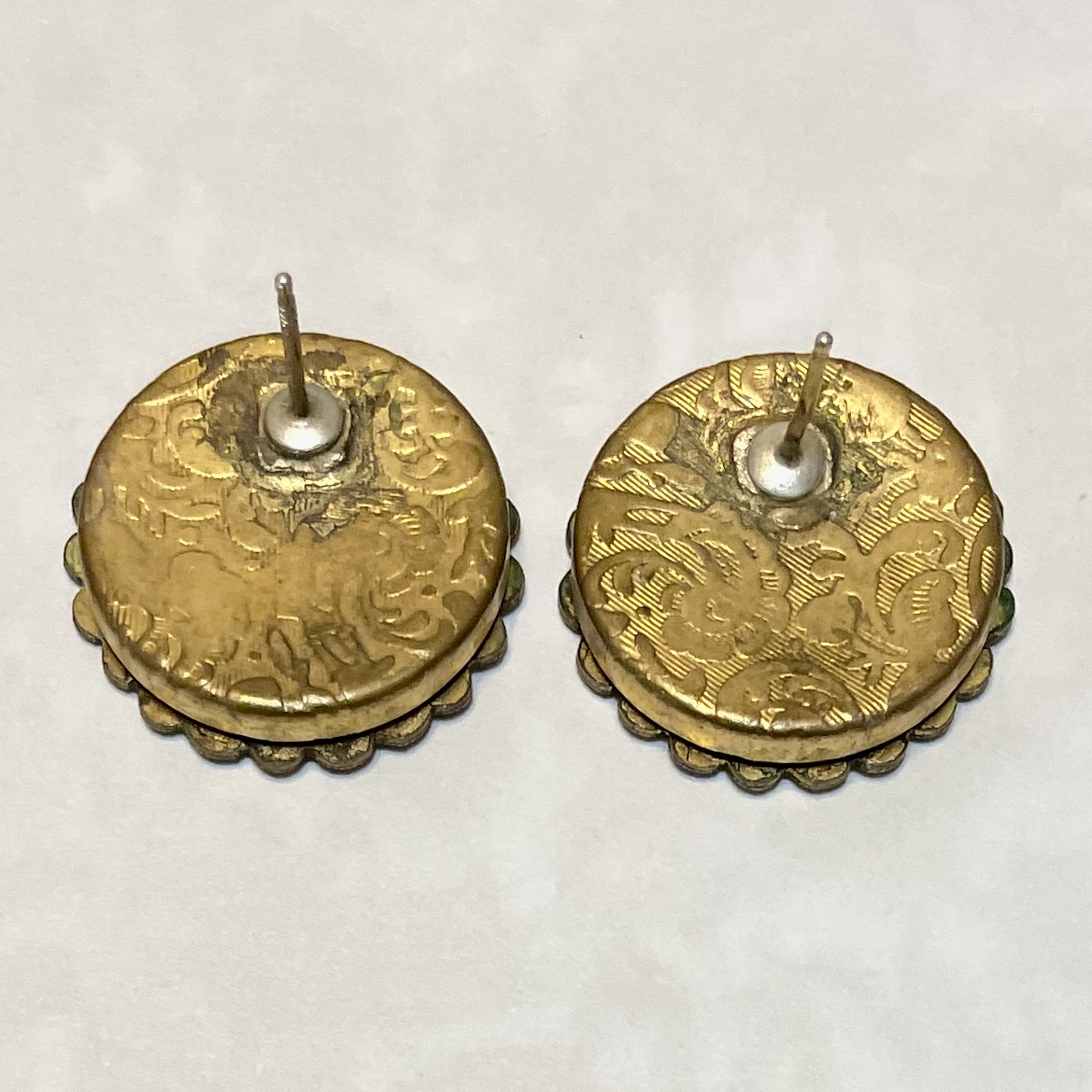 Pair of round engraved gold-tone stud earrings
