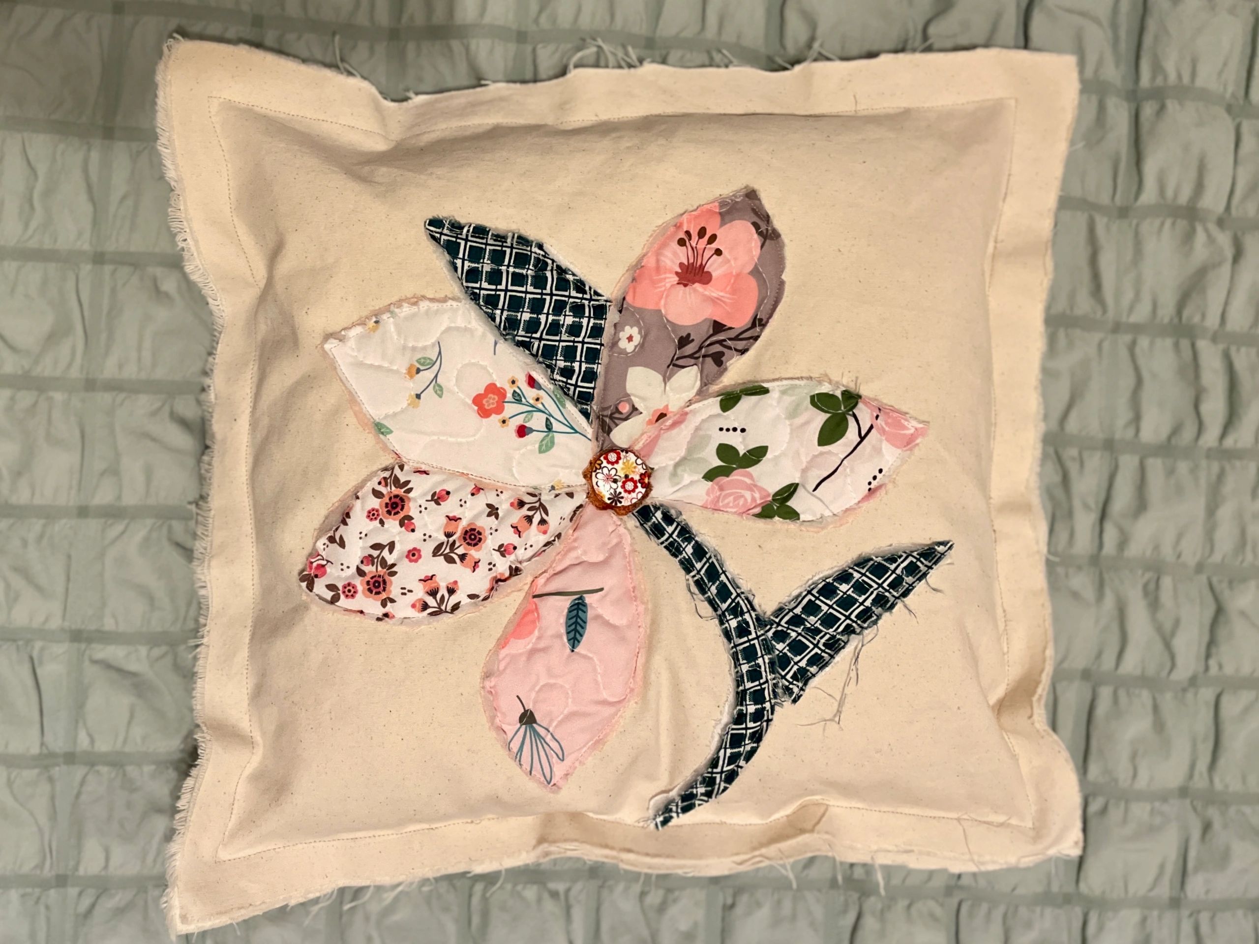 Patchwork floral applique pillow