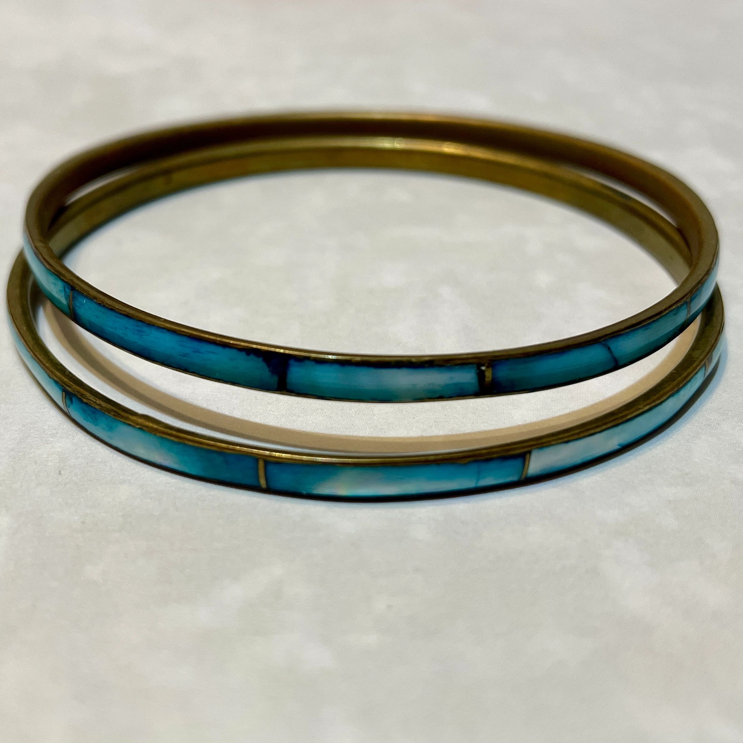 Two turquoise inlay brass bangles