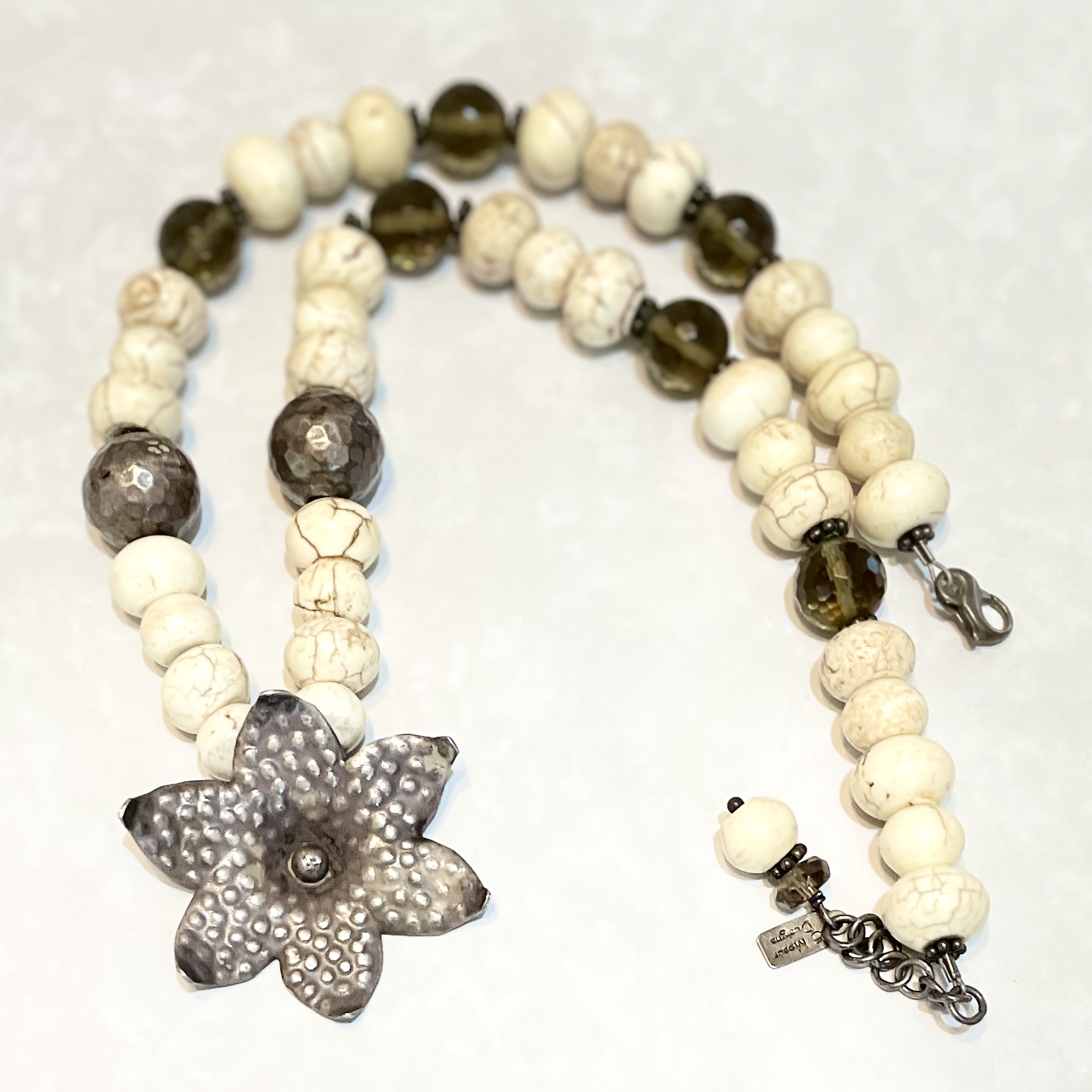 Handcrafted beaded necklace with flower