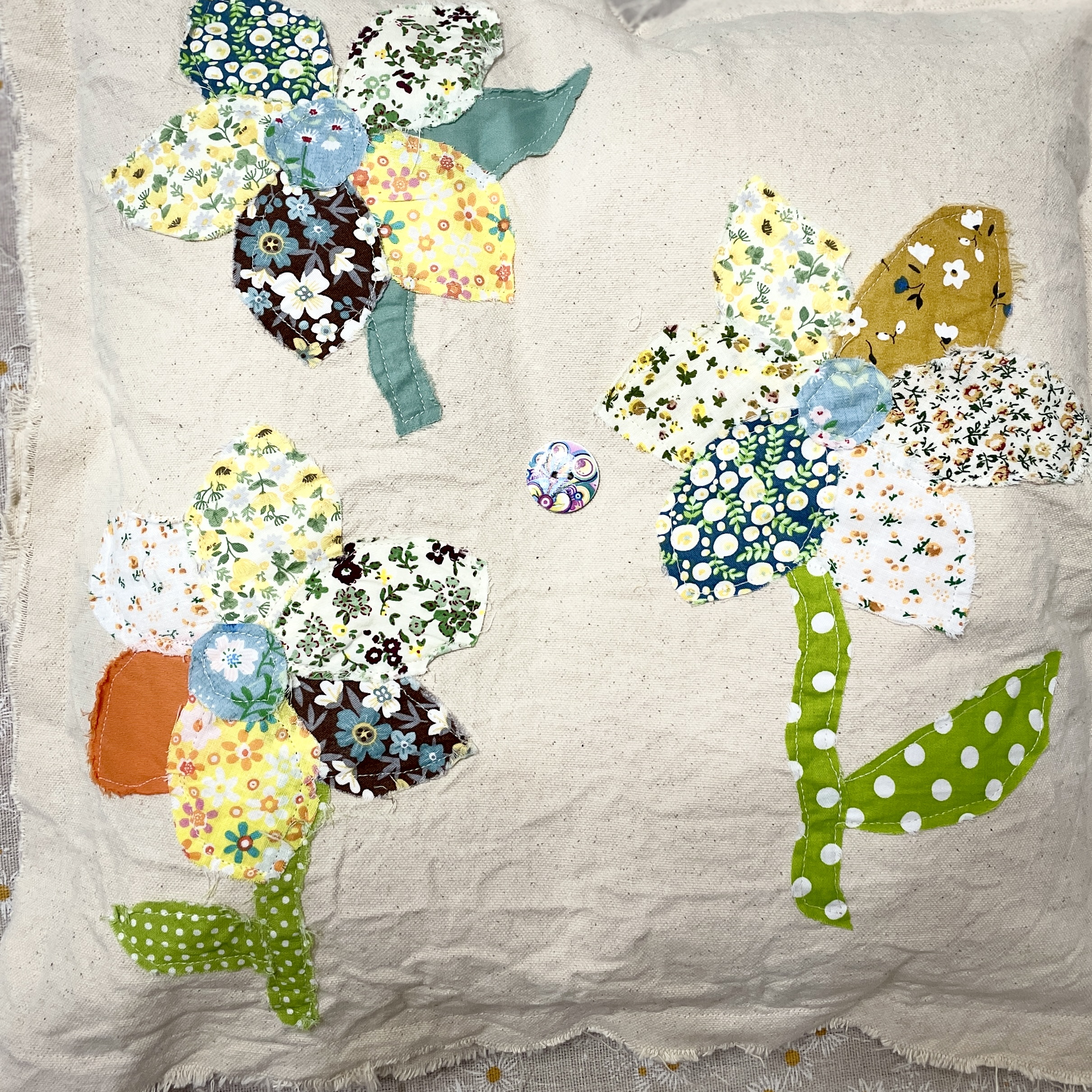 Colorful handmade floral fabric applique pillow cover