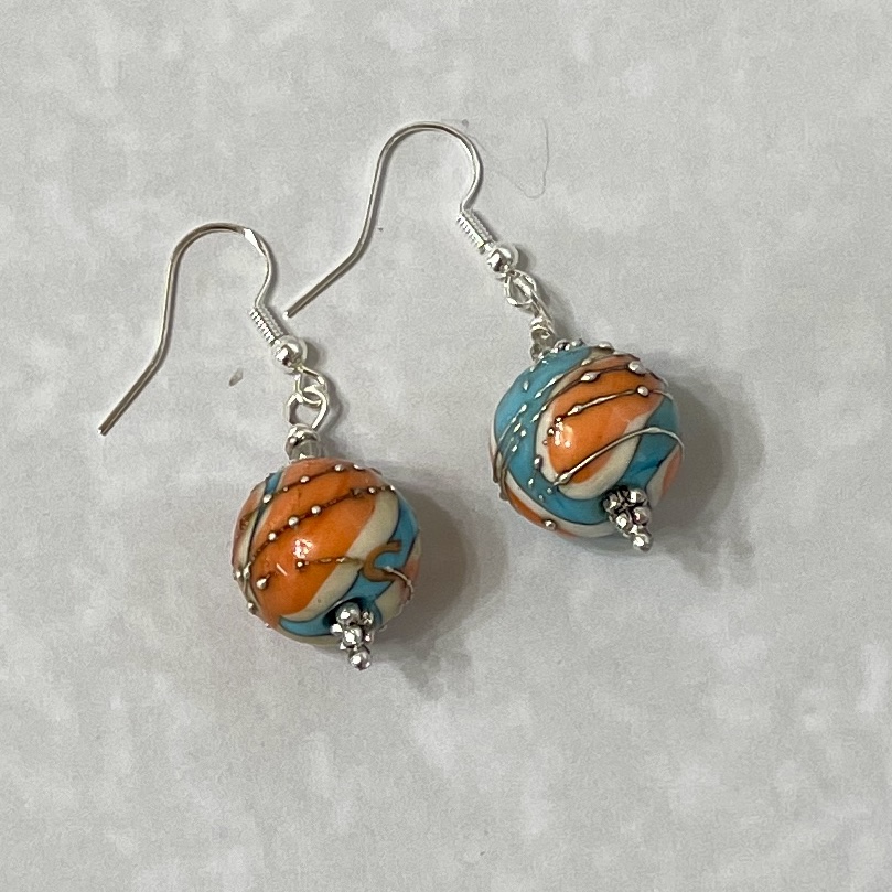 Orange and teal swirled glass bead earrings