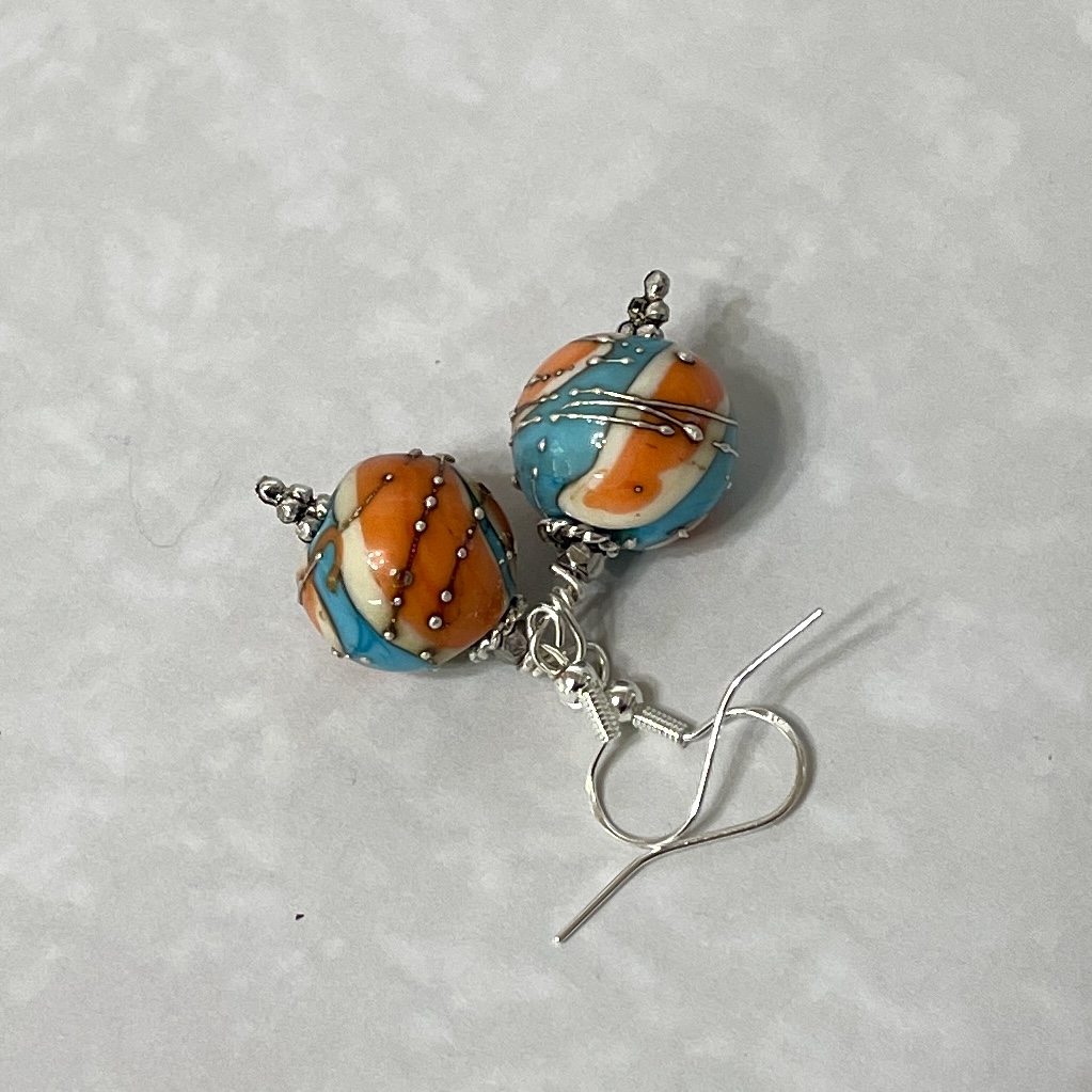 Orange turquoise lampwork bead dangle earrings