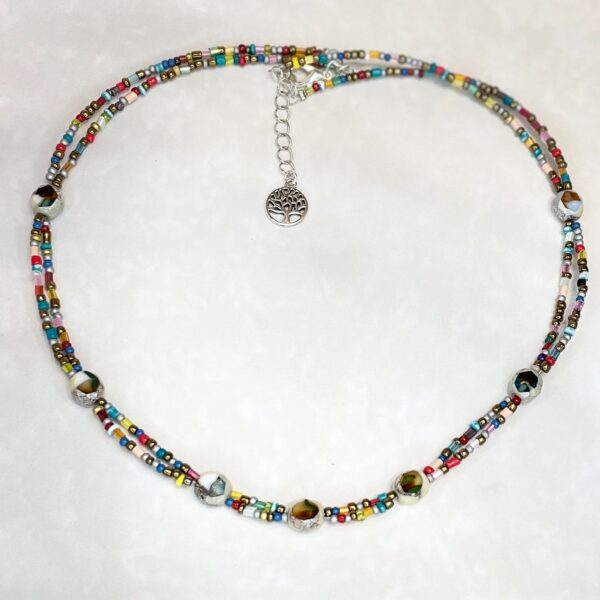 Vibrant beaded necklace featuring tree charm