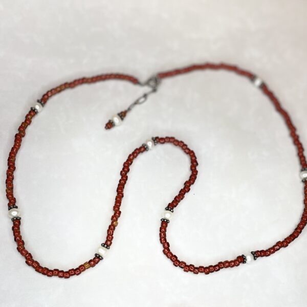 Chic red beaded necklace with shiny spacers