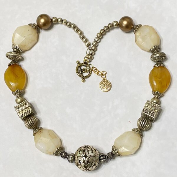 Beaded bracelet with cream and amber beads