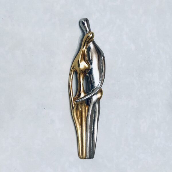 Stylish abstract pendant in silver and gold.