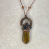 Copper wire-wrapped yellow crystal pendant