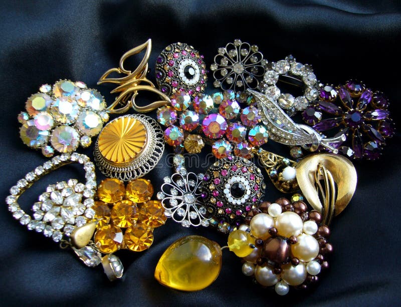 Colorful vintage rhinestone and pearl brooches
