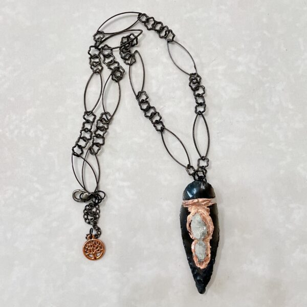 Black crystal pendant necklace with copper wrap