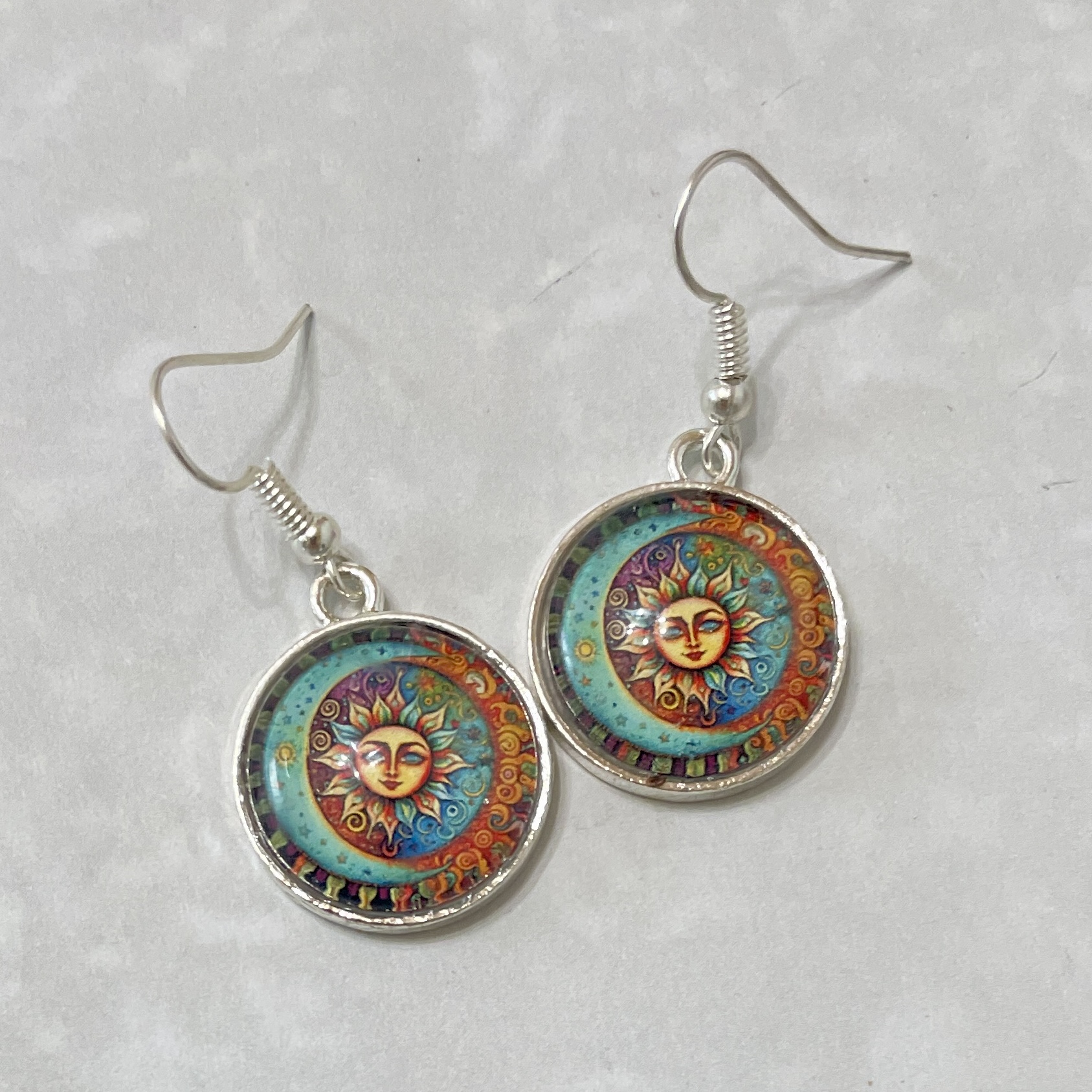Round colorful sun motif drop earrings