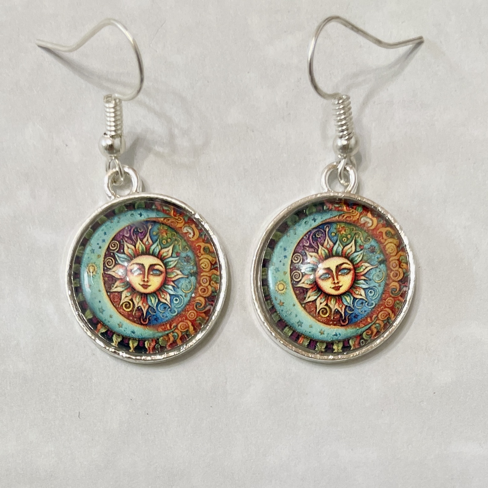 Colorful sun and moon dangle earrings