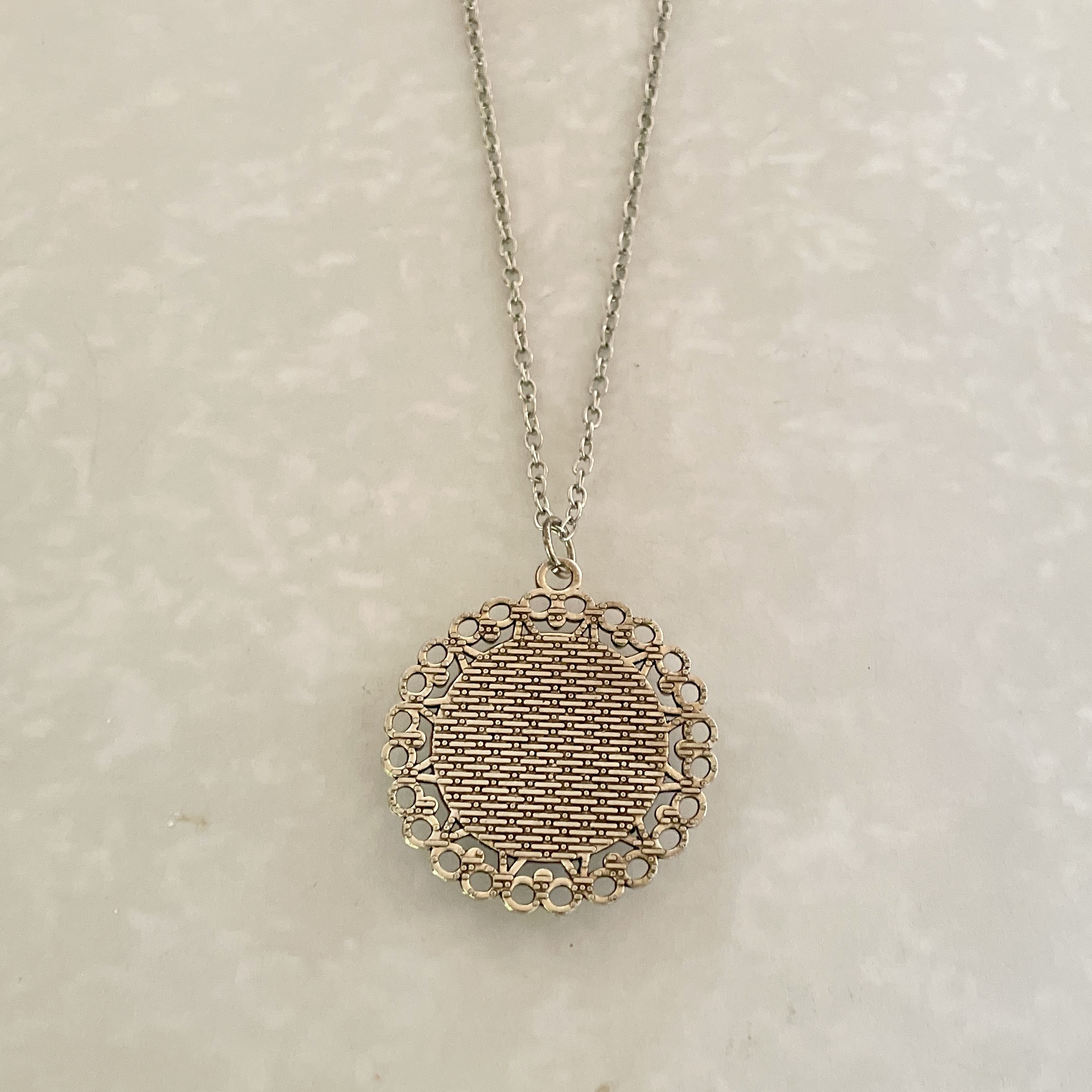 Silver round filigree pendant necklace