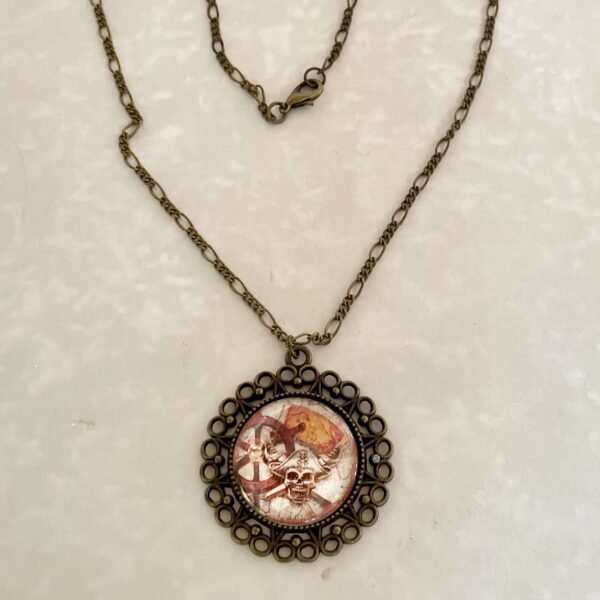 Antique bronze filigree necklace with skull pendant