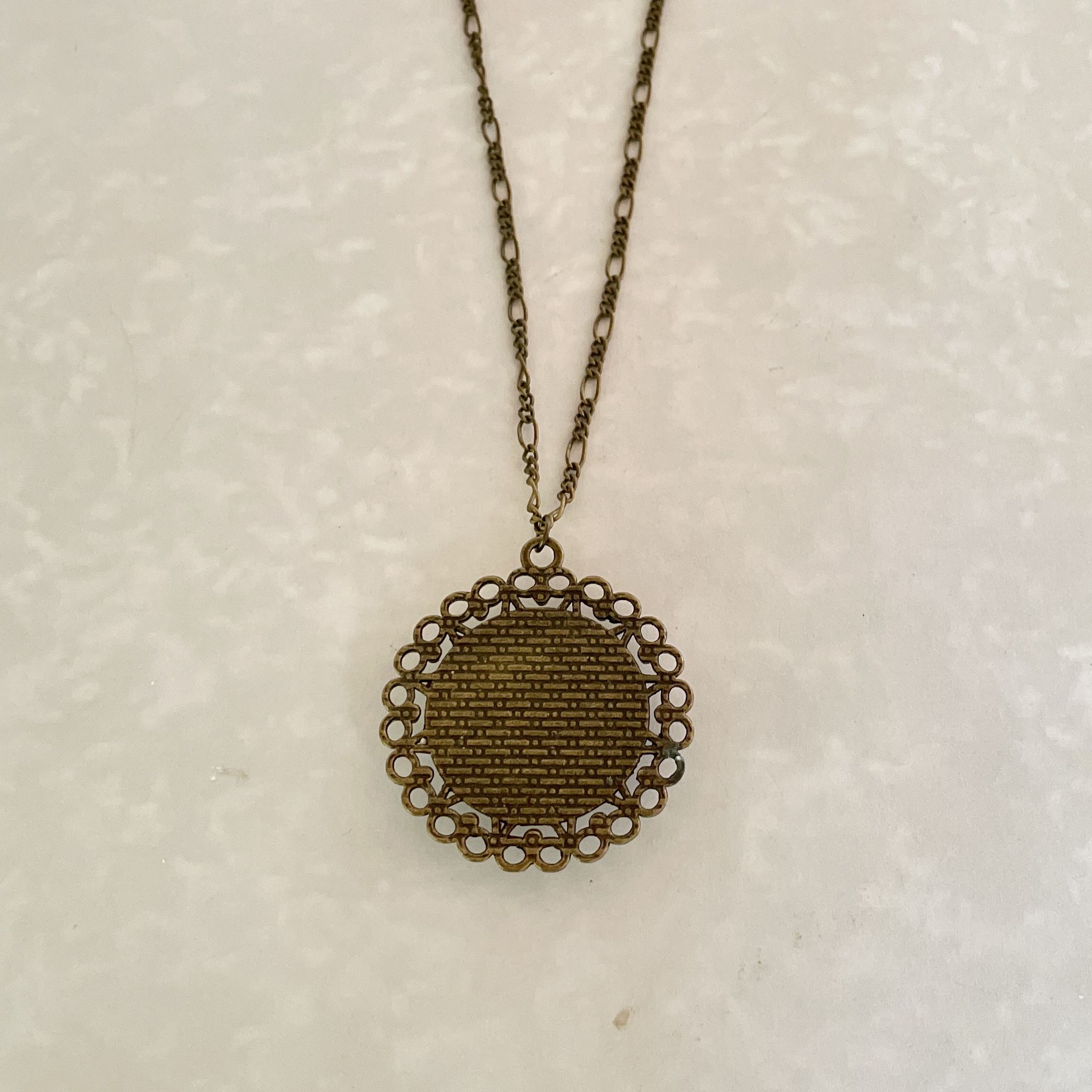 Antique brass filigree round pendant necklace