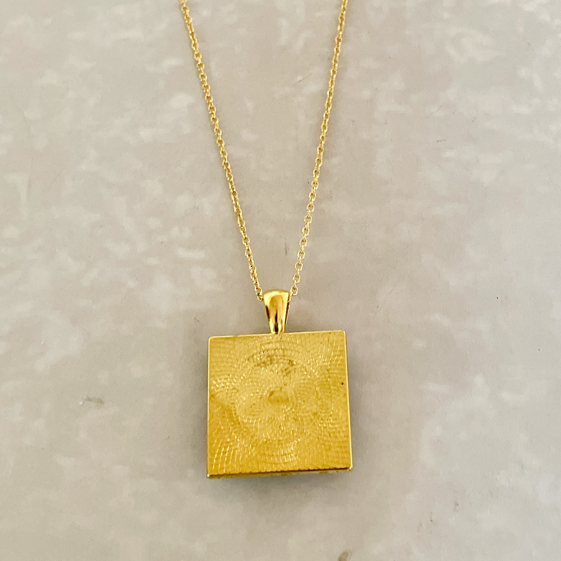 Gold square textured pendant necklace