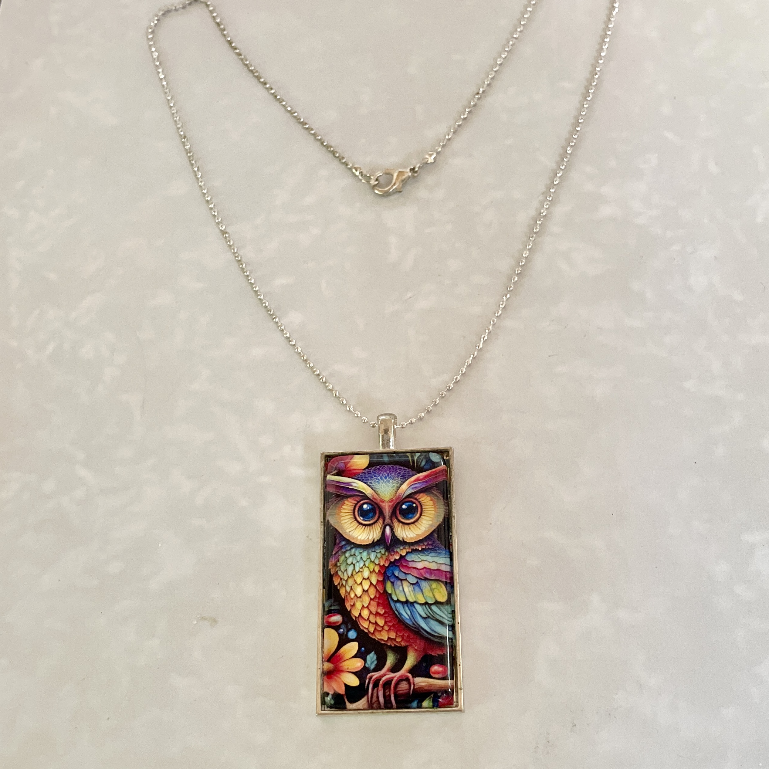 Colorful owl pendant necklace on silver chain