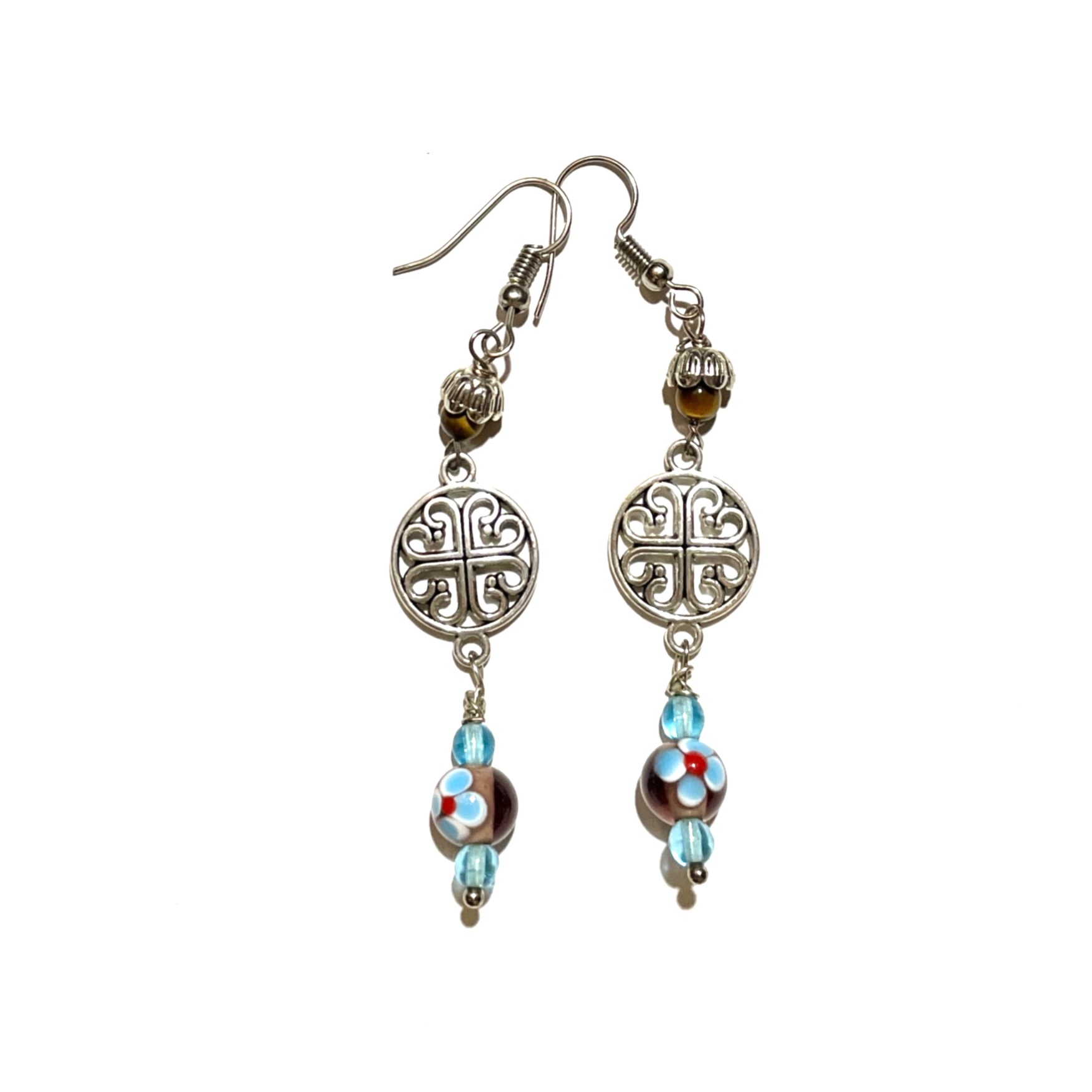Silver earrings with colorful beads and design.