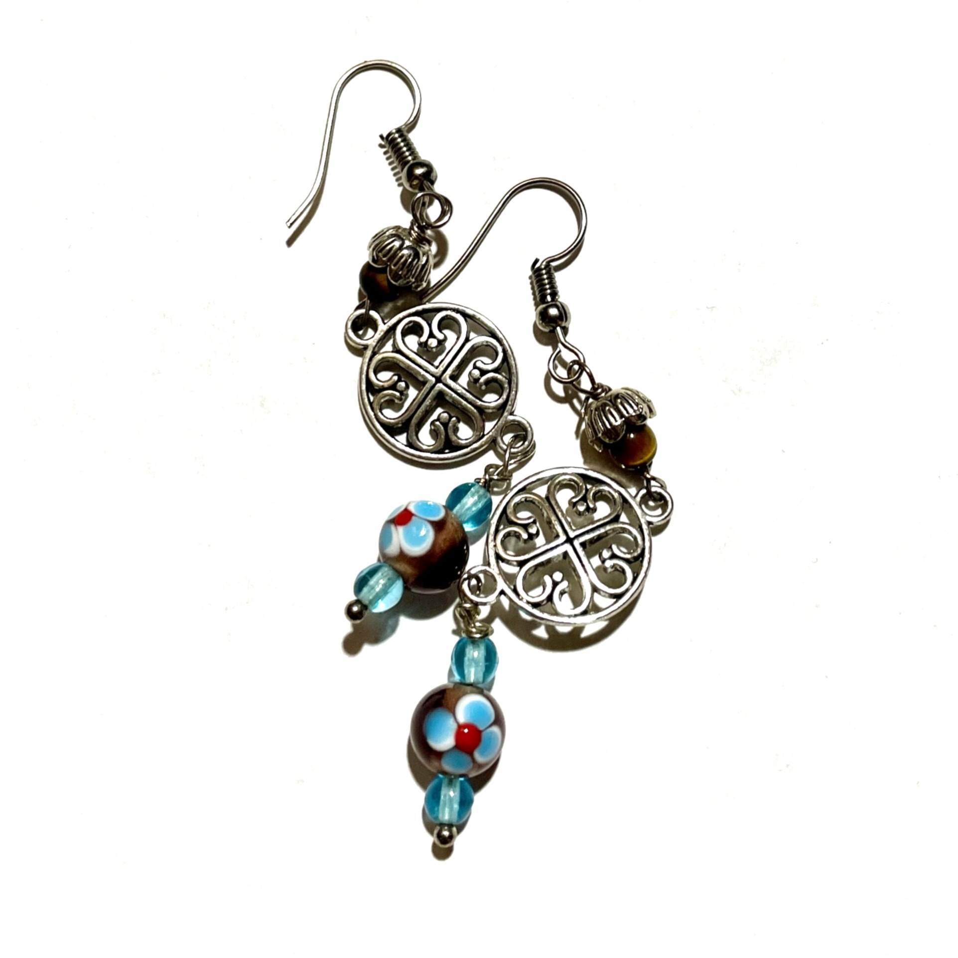 Silver earrings with colorful floral beads.