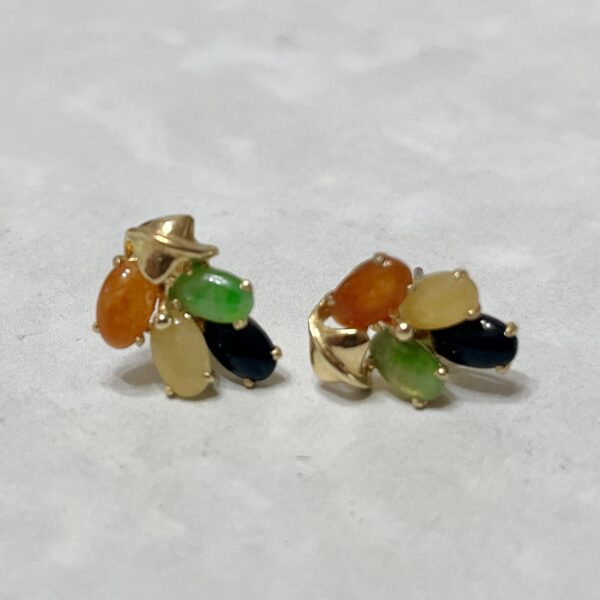 Colorful earrings featuring various gemstone shapes.